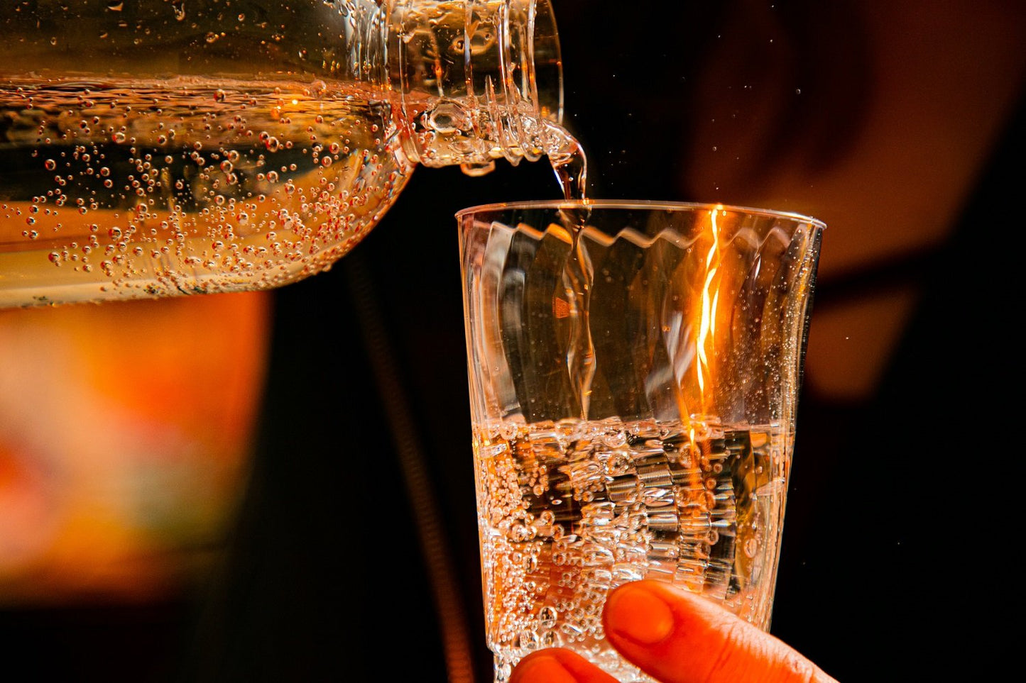 sparkling water poured into cup